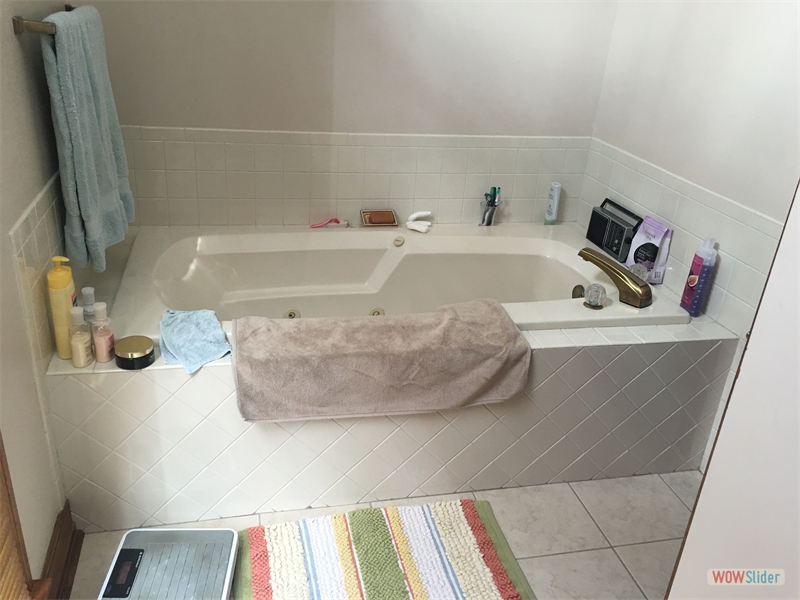 Re-tiled tub and surround